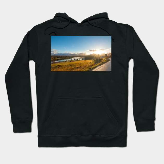 Beautiful norwegian scenery. Mountains in background. Horses are on the farm near river Hoodie by JohnKruger
